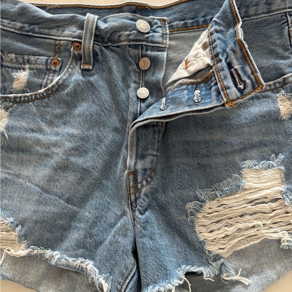 Levi's Light Blue Denim Jeans with White Pocket Lining and Branded Tags